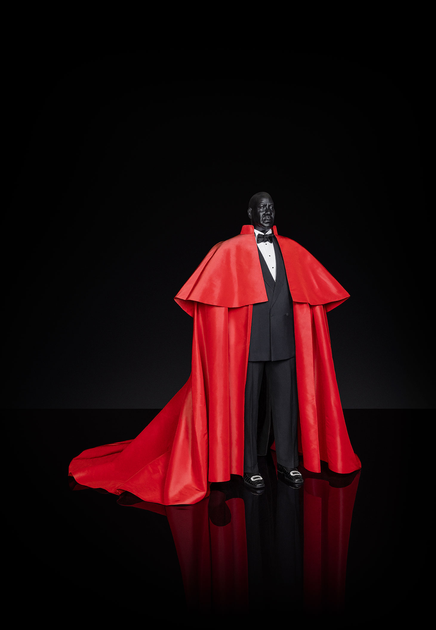 Mannequin in André Leon Talley's iconic red robe.
